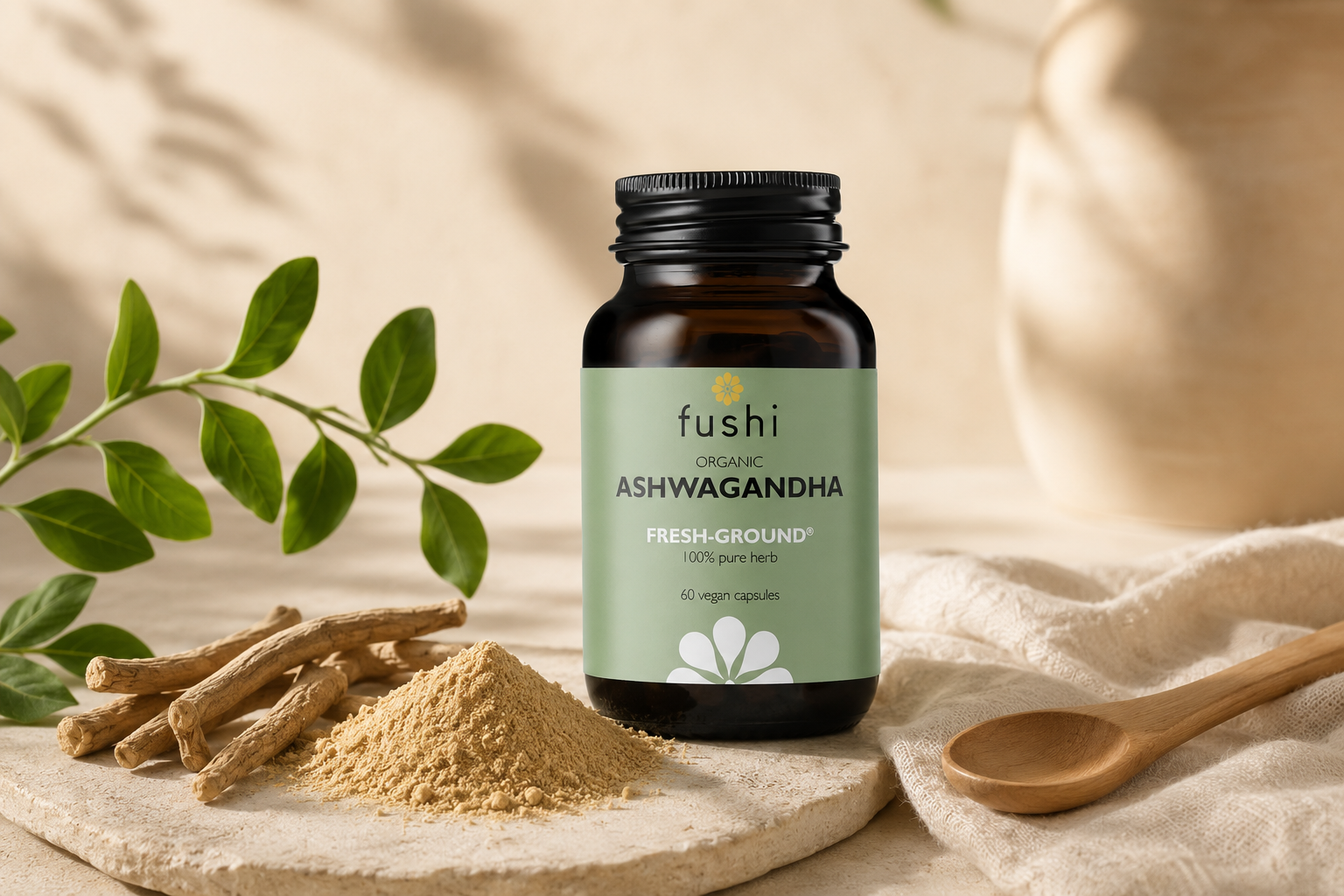 Fushi Ashwagandha jar with whole root, powder and a wooden spoon
